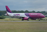 HA-LYA @ EGGW - HA-LYA Wizz Air  at Luton 5.7.14 - by GTF4J2M