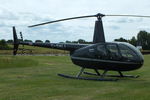 G-OHLI @ EGBT - ferrying race fans to the British F1 Grand Prix at Silverstone - by Chris Hall