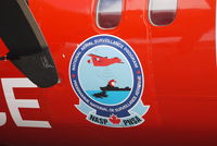 C-GSUR - Close up of emblem on fuselage. - by metricbolt