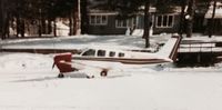 N136TP - Formerly N-23530, parked on a frozen lake in front of our cabin in Balsam Lake, WI.  We kept a 3500 foot runway plowed during the winter which made it very convenient to enjoy a day or two of snowmobiling. - by Tom Carlson