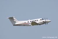 N335KW @ KSRQ - Beechcraft Super King Air 200 (N335KW) departs Sarasota-Bradenton International Airport enroute to Jacksonville International Airport - by Donten Photography