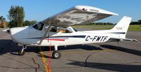 C-FMTF @ KAXN - Cessna 172S Skyhawk on the line. - by Kreg Anderson