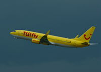 D-ATUB @ EDDL - TUIfly, is here taking off in front of a dark raincloud, at Düsseldorf Int'l(EDDL) - by A. Gendorf