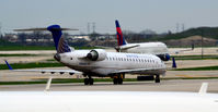 N166GJ @ KORD - Taxi O'Hare - by Ronald Barker