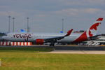 C-FMWV @ EGCC - Air Canada Rouge - by Chris Hall