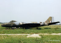 XH209 @ EDUO - Scanned from print. Partly singed EE Canberra XH209 on the dump at RAF Gutersloh in June '79, its services no longer required as a decoy at the airfield. An ex 16 Sqn RAF machine - you can see the 'Saint' image on the tail. - by Clive Pattle