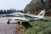 PH-BUS @ EHRD - Piper PA-24-250 Comanche [24-3551] Rotterdam~PH 29/08/1976 . From a slide. - by Ray Barber