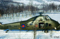 XT487 @ ENDU - Scanned from print - apols for cropped pic - Wessex HU.5 XT487 coded E of 845 NAS based at RNAS Yeovilton, on Exercise Clockwork '80 in Norway, March 1980. Red cross indicates assigned to Red forces in Red versus Blue Exercise. - by Clive Pattle