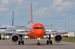 G-EZUI @ EGCC - Orange A320 holding. - by FerryPNL