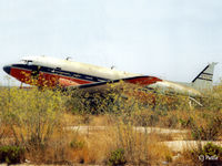 C-FITH @ LMML - Scanned from print. Dakota C-FITH at the International Fire Training Centre, Hal Far (disused), Malta in '94. Later saved for preservation. ICAO LMML used for reference/search purposes only. - by Clive Pattle