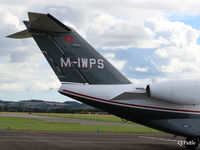 M-IWPS @ EGPN - Close-up of tail unit of M-IWPS (aircraft was parked very close to a fence that prevented a shot of the complete aircraft) parked up at Dundee Riverside. Note a based Cherokee of Tayside Aviation landing in the background. - by Clive Pattle