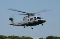 N401CV @ ESN - On approach to Martin State Airport MD - by J.G. Handelman