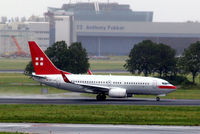 HB-JJA @ EHAM - Boeing 737-7AK [34303] (PrivatAir) Amsterdam-Schiphol~PH 10/08/2006 - by Ray Barber