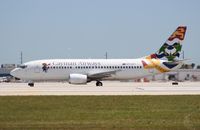 VP-CKY @ MIA - Cayman 737-300 - by Florida Metal