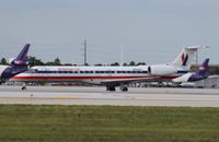 N681AE @ MIA - American Eagle E145LR - by Florida Metal