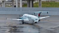 C-GORF @ CYYZ - Air Canada Express Beechcraft 1900D just departed the terminal. - by M.L. Jacobs