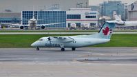 C-GANI @ CYYZ - Air Canada Express Dash 8 departed terminal. - by M.L. Jacobs