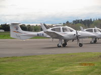 ZK-MTR @ NZPM - one of two DA42 on apron today - by magnaman