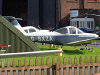 G-BXZA @ EGCB - Hiding round a corner at the City Airport Manchester - by Guitarist