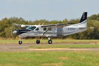 G-SYLV @ EGFH - Resident Grand Caravan operated by Skydive Swansea departing Swansea Airport with a lift of skydivers. - by Roger Winser