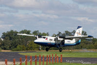 N30EA @ 8N2 - Touching down at Skydive Chicago - by Dave G