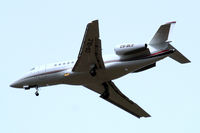 CS-DLC @ EGLL - Dassault Falcon 2000EX EASy [98] (NetJets Europe) Home~G 01/04/2010. On approach 27R. - by Ray Barber