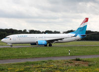 F-HJUL @ ELLX - Taxiing holding point rwy 24 for departure... Luxair summer lease from XL Airways - by Shunn311