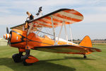 N5057V @ X5FB - Boeing A75N1(PT17) prior to a wing walking performance at the 2014 Sunderland Air Show. Fishburn Airfield, July 26th 2014. - by Malcolm Clarke