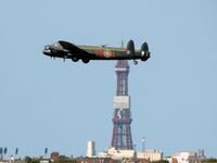 C-GVRA @ EGNH - CWHM Lancaster Mynarski VC with Blackpool Tower in background - by Ray Hindle