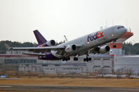 N604FE @ RJAA - At Narita - by Micha Lueck