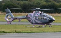 G-OPAH @ EGFH - Visiting helicopter operated by VLL Ltd. Very interesting colour scheme. - by Roger Winser
