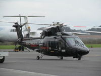 ZK-IAL @ NZAA - Medic chopper dropping of someone at AKL. Outside hangar where ZK-NSS is based. - by magnaman