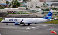 N318JB @ TNCM - Departing St Maarten. - by kenvidkid