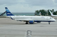 N192JB @ TNCM - Taxiing for departure. - by kenvidkid