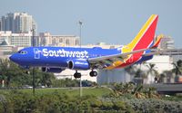 N913WN @ FLL - Southwest new 2014 colors - by Florida Metal