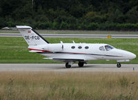OE-FCB @ LSGG - Taxiing holding point rwy 23 for deparure... - by Shunn311