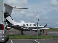ZK-MPG @ NZAA - At corporate centre with N588PX G550 in background - by magnaman