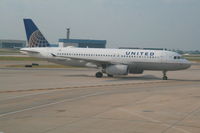 N487UA @ KORD - Arriving to gate - by Daniel Vanderauwera