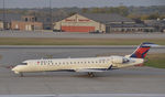 N717EV @ KMSP - Taxiing for departure at MSP - by Todd Royer