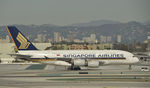 9V-SKL @ KLAX - Taxiing to gate at LAX - by Todd Royer