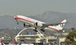 B-2083 @ KLAX - Departing LAX on 25R - by Todd Royer