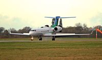 N50KC @ EGTK - Landing on runway 19 on a cold, wintery day - by G TRUMAN