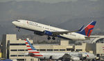 N3735D @ KLAX - Departing LAX on 25R - by Todd Royer