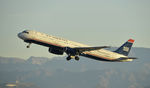 N543UW @ KLAX - Departing LAX on 25R - by Todd Royer