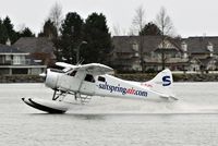 C-FJFL @ YVR - In its latest livery.Departure from Fraser River. - by metricbolt