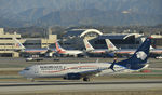 XA-AML @ KLAX - Taxing to gate after landing on 25L at LAX - by Todd Royer