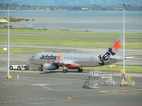 VH-VFJ @ NZAA - from viewing gallery through thick glass - by magnaman