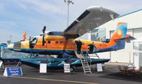 N77TF @ ORL - Viking Twin Otter with cool paint - by Florida Metal