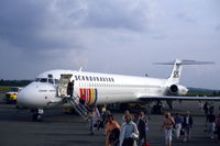 LN-RLG @ ESNQ - Passenger disembarking a SAS MD-82 at Kiruna airport in northern Sweden. - by Henk van Capelle