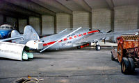 OH-VKU @ EFHK - OH-VKU   Lockheed 18-56 Lodestar [18-2006] (Kar-Air) Helsinki-Vantaa~OH 13/06/1988. Seen stored here in hangar prior to being put into the museum.. From a slide. - by Ray Barber